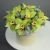Композиция в шляпной коробке из 11 лаймовых орхидей в Электростали Композиция в шляпной коробке из 11 лаймовых орхидей в Электростали