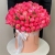 Композиция в шляпной коробке из 113 пионов Корал Шарм в Электростали